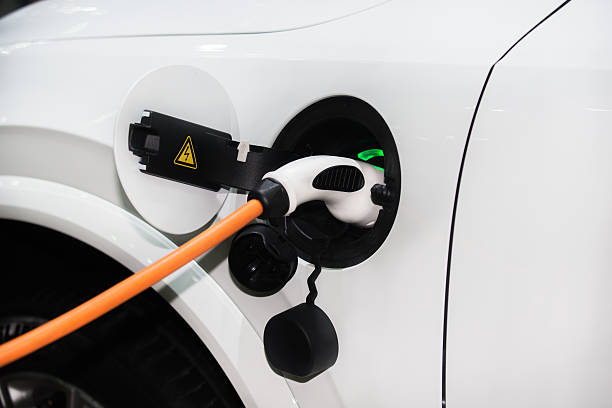 istock Power supply for hybrid electric car charging battery. 637839542