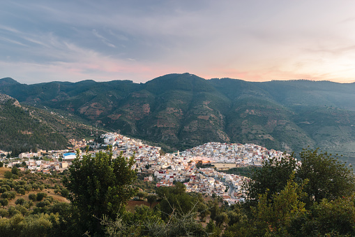 Panoramic view over the holy and historical town Moulay Idriss Zerhoun at sunset, Morocco.