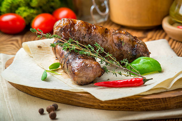 istock Grilled sausage with sauce 637839944