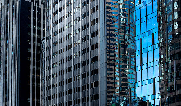 istock windows of business building 637842250