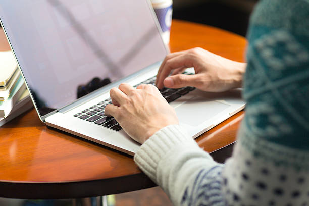 istock young asian man studying with laptop 637845486