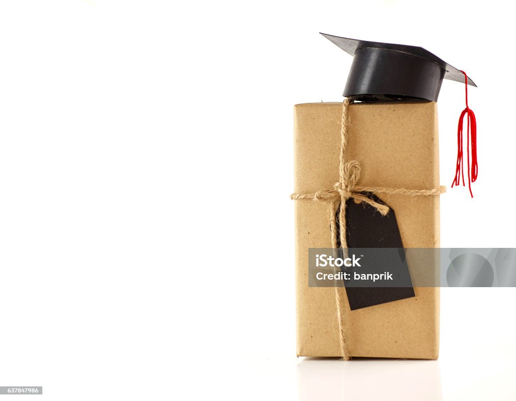 Graduate gift box Gift box and graduate cap on white background Gift Stock Photo
