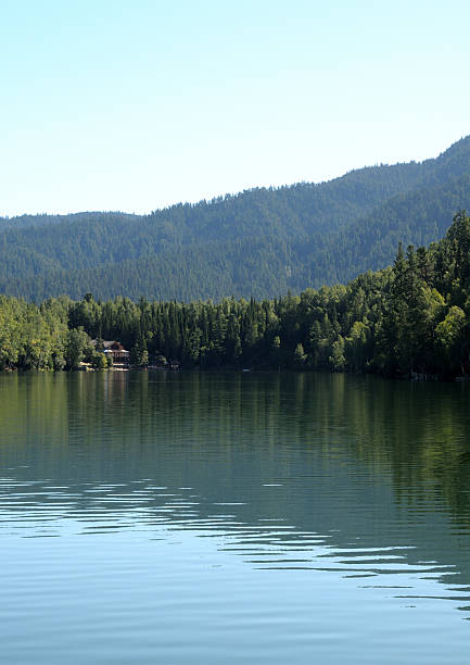 istock In  clear water of a forest lake reflects  sky, mountain 637849324