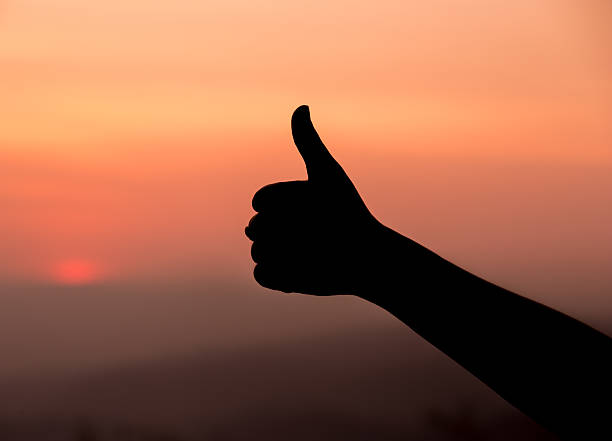 istock silhouette of Thumb up or like sign 637850588