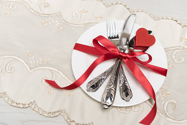istock Valentines day table setting. plate in shape of heart 637853052