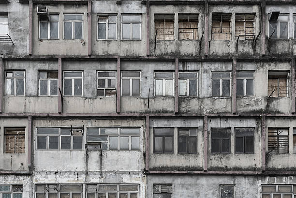 Abandoned residential building Abandoned residential building in Hong Kong city chinese slum stock pictures, royalty-free photos & images