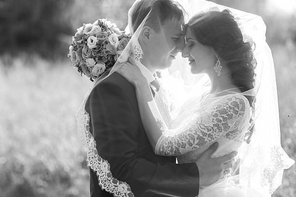 istock bride and groom celebrating wedding 637858518