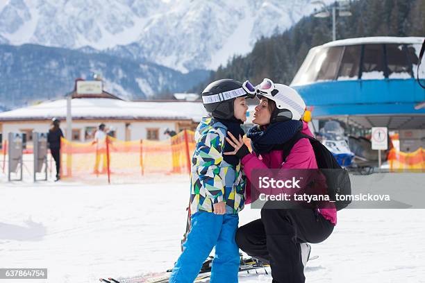 Beautiful Young Mom And Her Toddler Boy Stock Photo - Download Image Now - Family, Skiing, Vacations