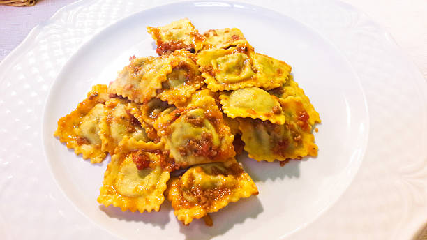 Ravioli with ragout sauce, Italian Cuisine stock photo