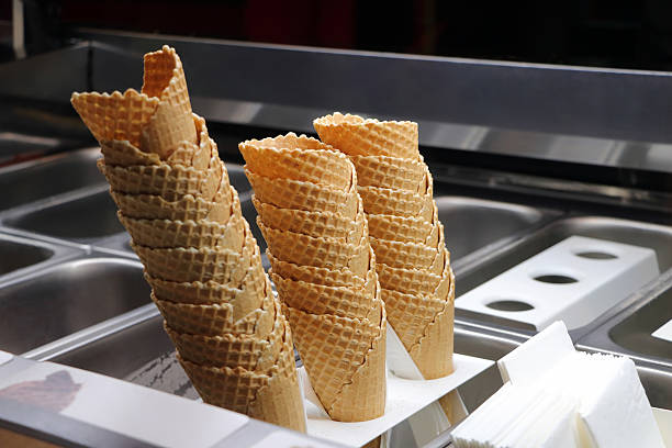 istock waffle cone in the stall with ice cream 637872742