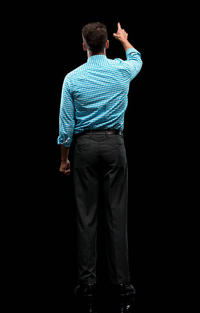istock Rear view of businessman pointing away 637877960