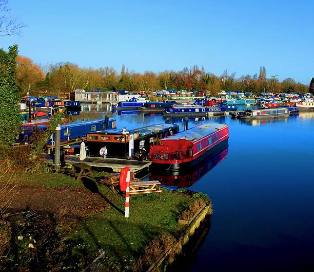 istock Colourful Canal Boats Moored in the Harbour 637878010