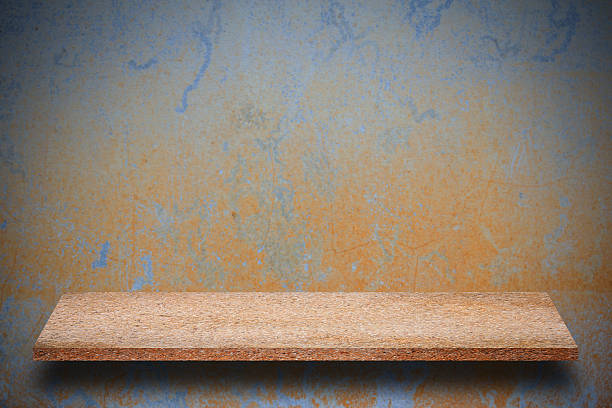 istock Empty top of natural stone shelves and stone wall background 637878482