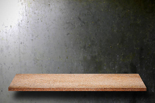 istock Empty top of natural stone shelves and stone wall background 637878602
