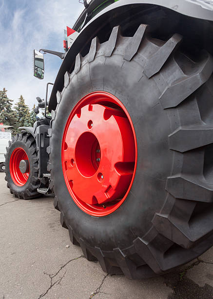 istock Close up of tractor tire, selective focus. 637880772
