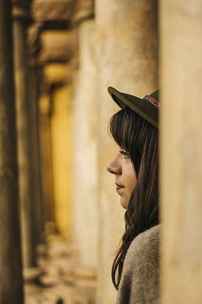 istock Young woman at cloister 637882358