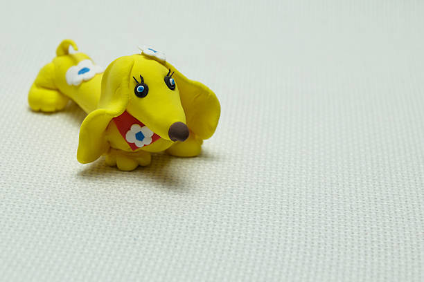 istock Dog a toy made of plasticine 637882578