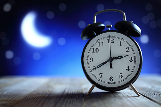 Alarm clock in the middle of the night insomnia Alarm clock in the middle of the night insomnia or dreaming insomnia stock pictures, royalty-free photos & images