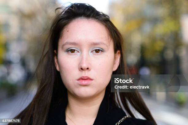 Serious Young Woman Stock Photo - Download Image Now - Only Women, Serious, White People