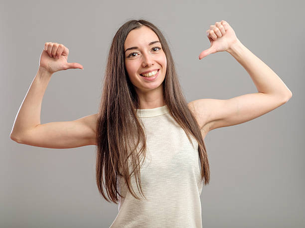 istock Woman pointing at herself 637887544