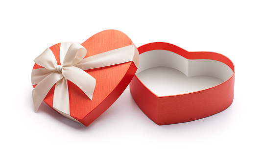 Red heart shape open gift box isolated on white background - Clipping path included