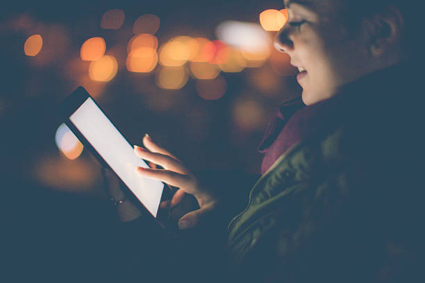 istock Young woman having fun on her tablet 637887904