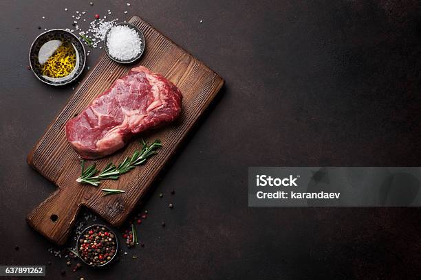 Raw Ribeye Beef Steak Cooking With Ingredients Stock Photo - Download Image Now - Meat, High Angle View, Ingredient