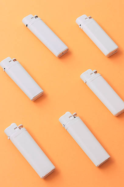 istock six lighters painted with white color 637892568