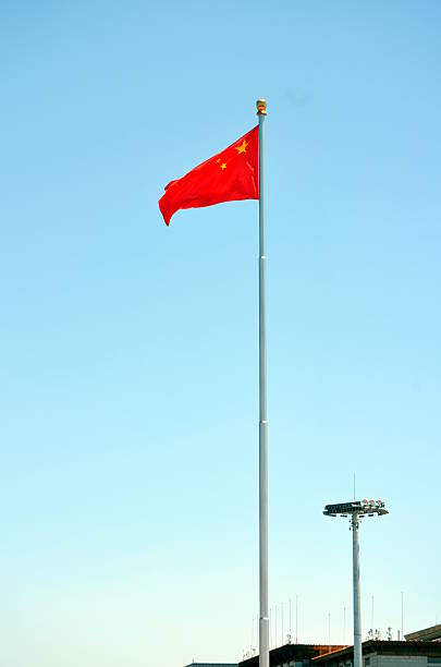 istock Chinese national flag waving on a clear day 637893570