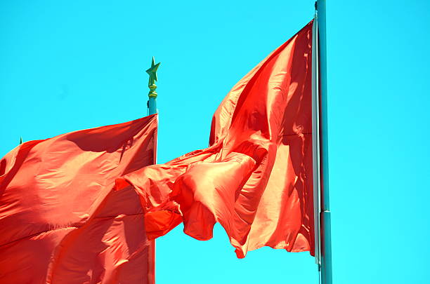 istock Chinese national flag waving on a clear day 637893746