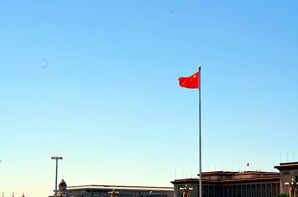 istock Chinese national flag waving on a clear day 637893992