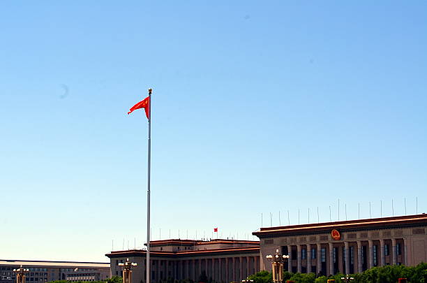 istock Chinese national flag waving on a clear day 637894062