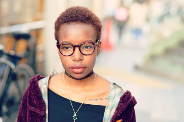 istock Young woman not looking at the camera 637894490
