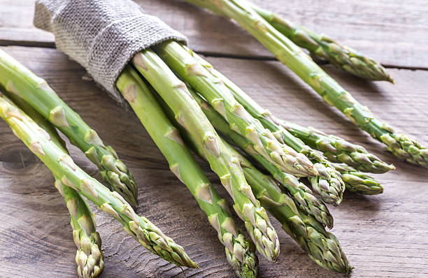 istock Bunch of fresh asparagus 637897428