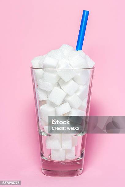 Glass Full Of Sugar Cubes Unhealthy Diet Concept Stock Photo - Download Image Now