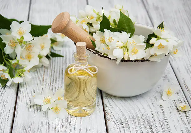 Photo of Massage oil with jasmine flowers