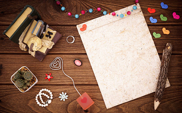 istock Blank notebook and woman's accessories with hearts with pencil o 637904582