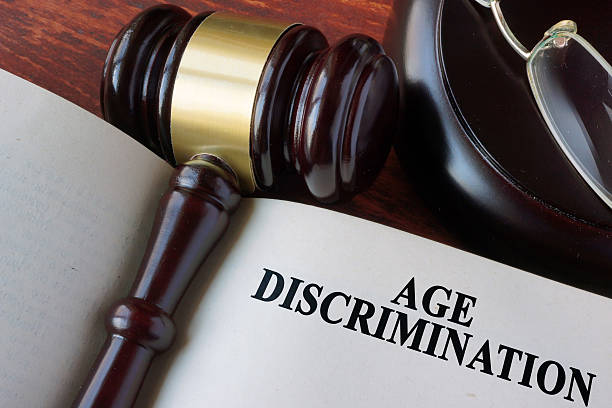 istock Book with chapter age discrimination and a gavel. 637905226