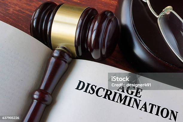 Book With Chapter Age Discrimination And A Gavel Stock Photo - Download Image Now - Prejudice, Aging Process, Human Age
