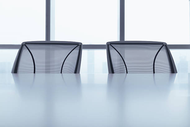 istock Office chairs at table in meeting room 637907098