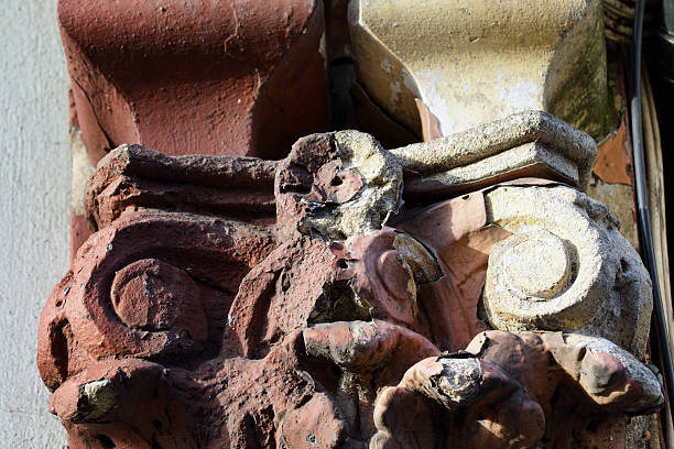istock Corroded old ionic capital decoration Victorian London 637908392