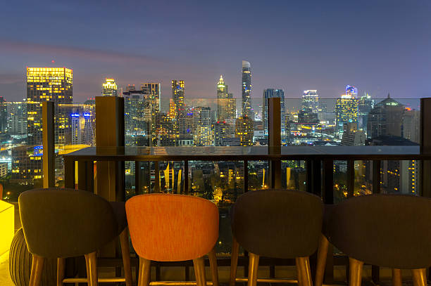 Bangkok city view point from rooftop of building, Bangkok city view point from rooftop of building, blue sky and city light, Bangkok is the most populated city in Southeast Asia. Bangkok , Thailand silom stock pictures, royalty-free photos & images