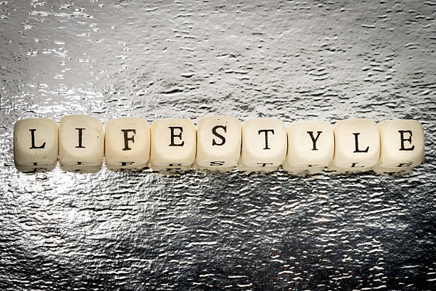 Lifestyle word on a wooden cubes on a shiny silver background