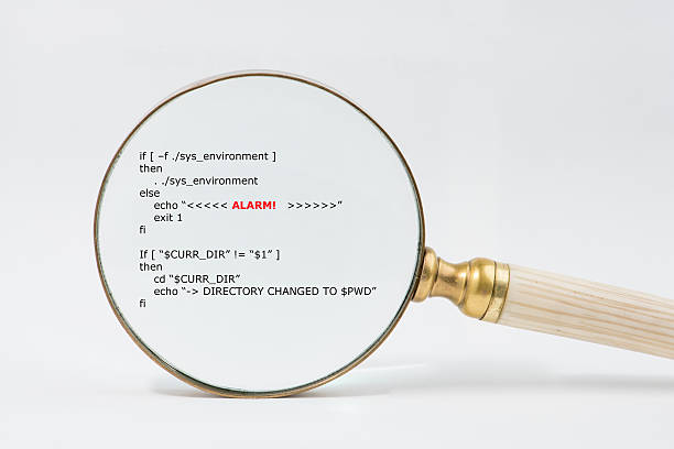 antique magnifier with ivory handle magnifies short unix scripts. - unix imagens e fotografias de stock