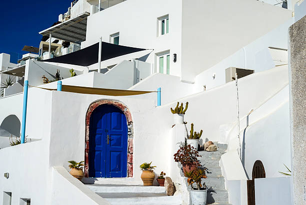 istock White Mediterranean House With Blue Arch Door 637917254