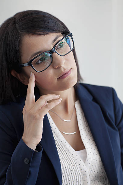 istock Businesswoman thinking in office 637917650