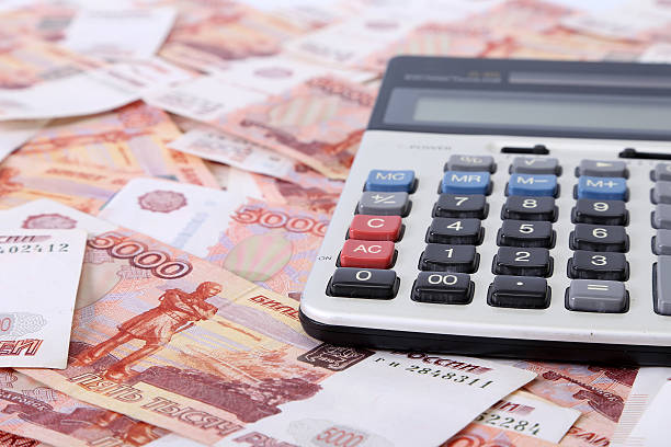 istock Close-up of russian banknotes (Five Thousand Ruble Notes) and calculator 637919292