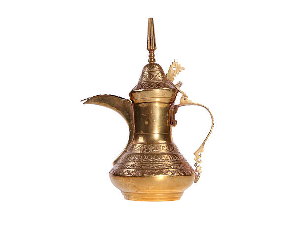istock Copper jug with a traditional Arabic ornaments 637920822