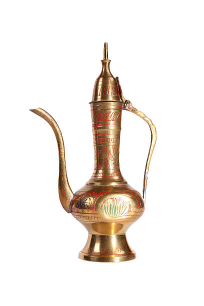 istock Copper jug with a traditional Arabic ornaments 637920876