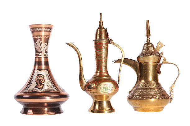 istock Copper jug with a traditional Arabic ornaments 637921122